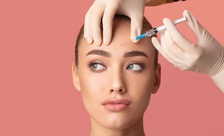 A woman getting BOTOX Cosmetic in her forehead