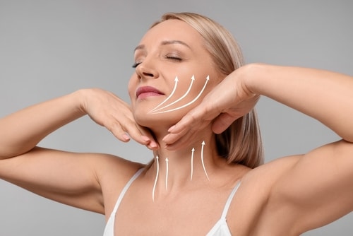 Woman,With,Perfect,Skin,After,Cosmetic,Treatment,On,Grey,Background.